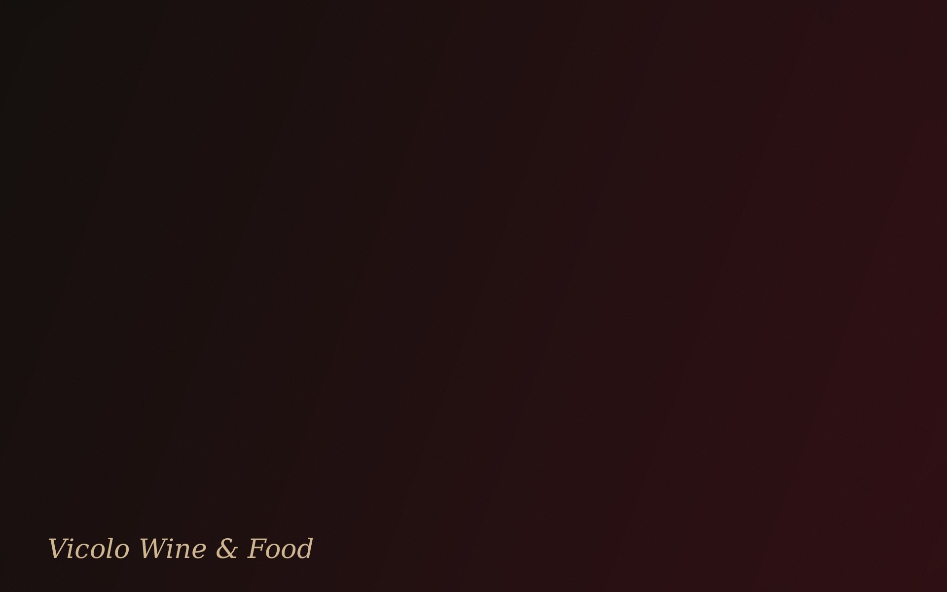 Interno del ristorante Vicolo Wine & Food, luci soffuse e calici di vino sul tavolo